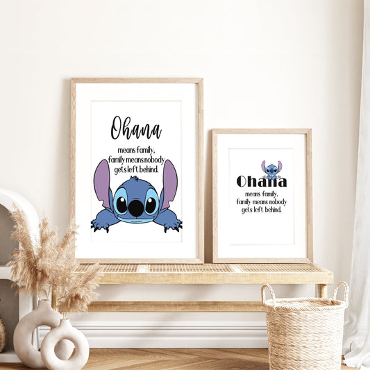 Framed 'Ohana' prints with a cartoon character on a wooden shelf. lilo and stitch wall posters