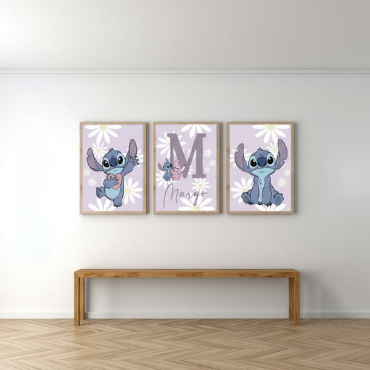 Three framed illustrations of Lilo and Stitch on a daisy background art print  on a wall above a wooden bench.