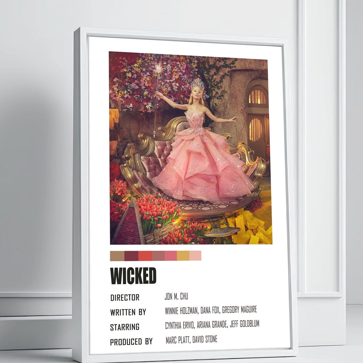 Framed poster of 'Wicked' the movie with a character in a pink dress against a colorful background.